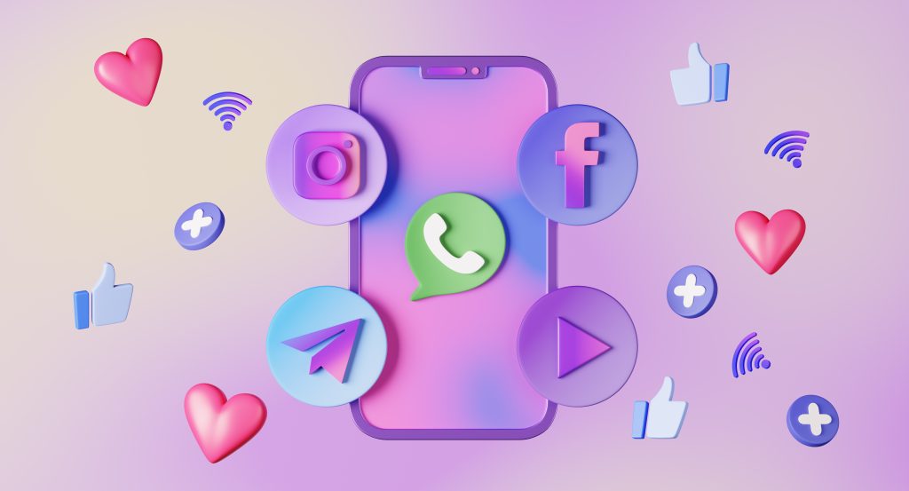 A whimsical 3D illustration of a smartphone surrounded by vibrant social media icons and symbols, including a pink heart, blue thumbs-up, WiFi signal, Instagram camera, Facebook 'f,' WhatsApp chat bubble, Telegram paper plane, and a play button. The pastel gradient background from pink to purple represents social media management services through Figfame's digital marketing agency's dynamic and engaging nature.